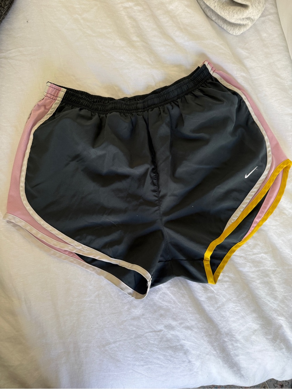 Nike Black Athletic Shorts with Pink Panels and Yellow Trim